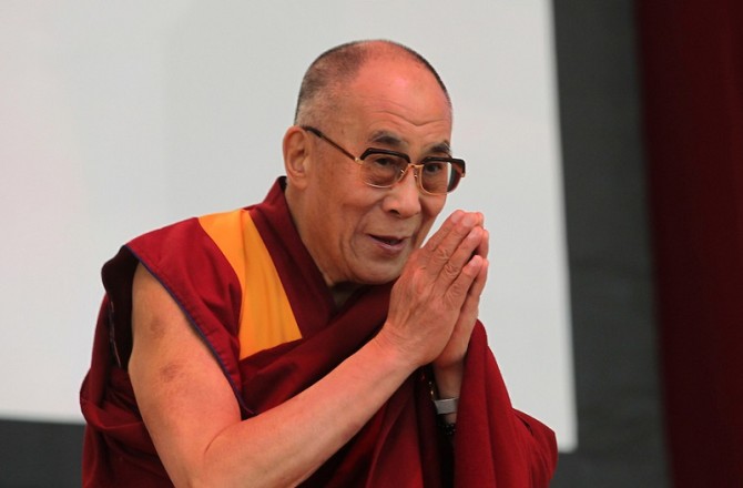 Tenzin Gyatso, His Holiness the14th Dalai Lama of Tibet, delivered a message of peace and compassion to 3,800 people at the nTelos Wireless Pavilion Thursday in Charlottesville, VA. Photo/The Daily Progress/Andrew Shurtleff