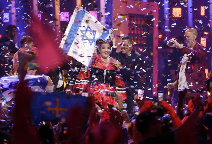 Netta from Israel celebrates after winning the Eurovision Song Contest grand final in Lisbon, Portugal, Saturday, May 12, 2018. (ANSA/AP Photo/Armando Franca) [CopyrightNotice: Copyright 2018 The Associated Press. All rights reserved.]