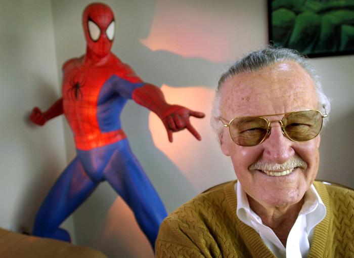 FILE - In this April 16, 2002, file photo, Stan Lee, 79, creator of comic-book franchises such as "Spider-Man," "The Incredible Hulk" and "X-Men," smiles during a photo session in his office in Santa Monica, Calif. Comic book genius Lee, the architect of the contemporary comic book, has died. He was 95. 
 (ANSA/AP Photo/Reed Saxon, File) [CopyrightNotice: AP2002]
