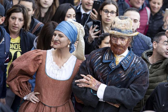Italian singers Biagio Antonacci (R) dressed as Vincent van Gogh and  Laura Pausini dressed as "Girl with a Pearl Earring" (Artwork by Dutch artist Johannes Vermeera) pose in Trinità dei Monti in Rome, Italy, 14 May 2019. The two Italian artists have chosen this disguise to advertise their new summer tour together.
ANSA/MASSIMO PERCOSSI