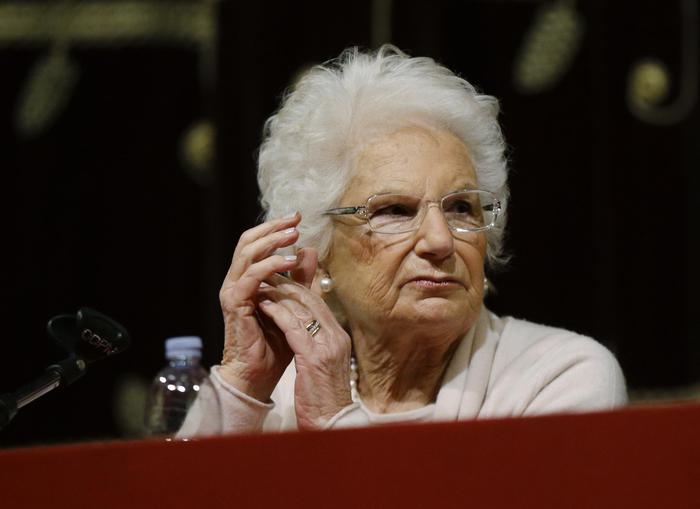 Holocaust survivor Liliana Segre speaks with young students on the occasion of an Holocaust remembrance, at the Arcimboldi theatre in Milan, Italy, Wednesday, Jan. 24, 2018. Segre, a senator for life, unwittingly provoked one of Italys most intense confrontations with anti-Semitism since the fall of the Fascist dictatorship when she proposed a motion to create a parliamentary commission against anti-Semitism which the center-right abstained from voting. (ANSA/AP Photo/Luca Bruno) [CopyrightNotice: Copyright 2018 The Associated Press. All rights reserved.]